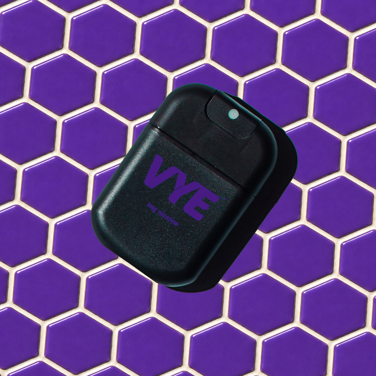 VYE Mist pack on a purple mosaic background, Berry flavour.